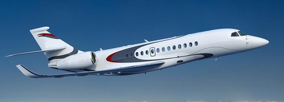 Executive luxury business jet flying above clouds in blue sky